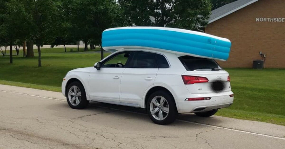 Mom had young daughters ride in inflatable pool on top of car 'to hold it down'