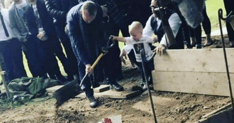 Heartbreaking moment 17-month-old toddler shouts 'daddy' as he helps bury father who was knifed to death