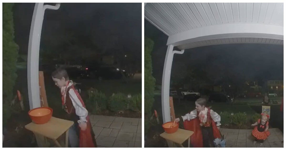 Little boy is caught filling empty trick-or-treat bowl with his own candy for other kids