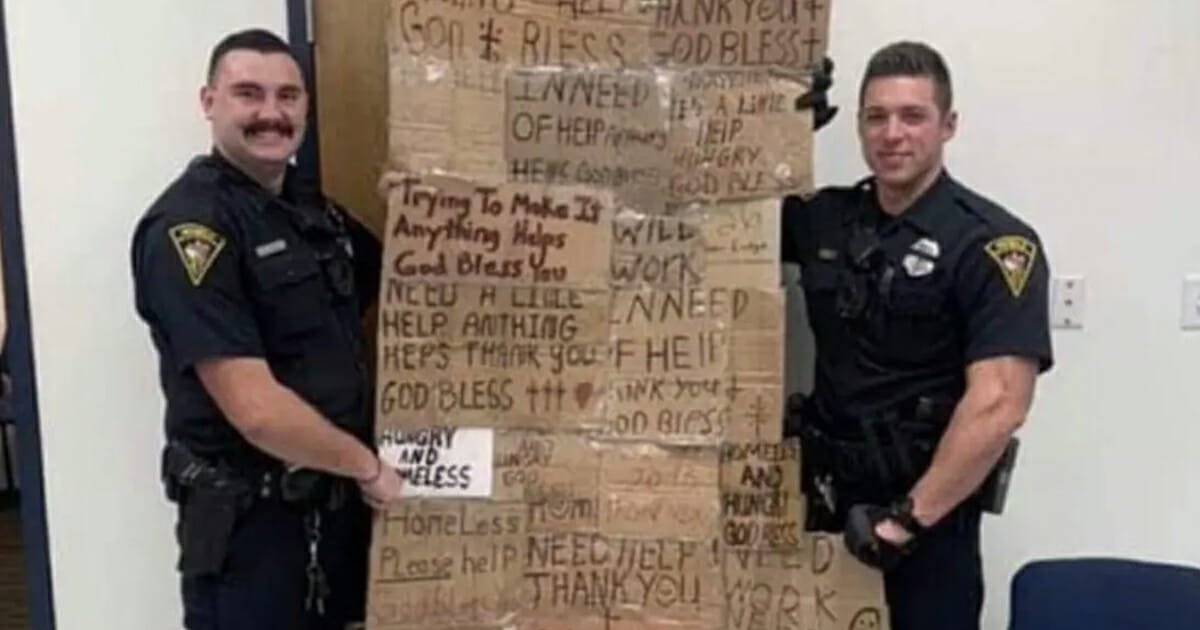 Alabama cops make "quilt" out of signs they've taken away from homeless people who needed them