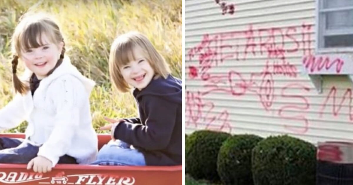 Thugs spray-paint 'Retards' on family's home after they adopt two little girls with Down syndrome